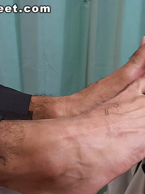 Dr. Thom worships Lando’s socked feet at clinic