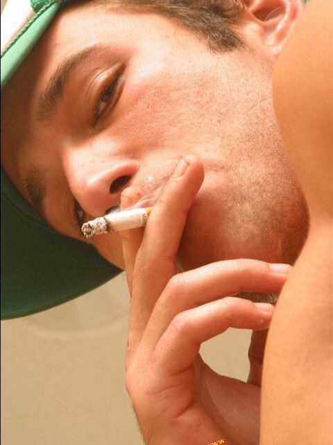 Cowboy Cody masturbates hard while smoking and shows his bubble butt