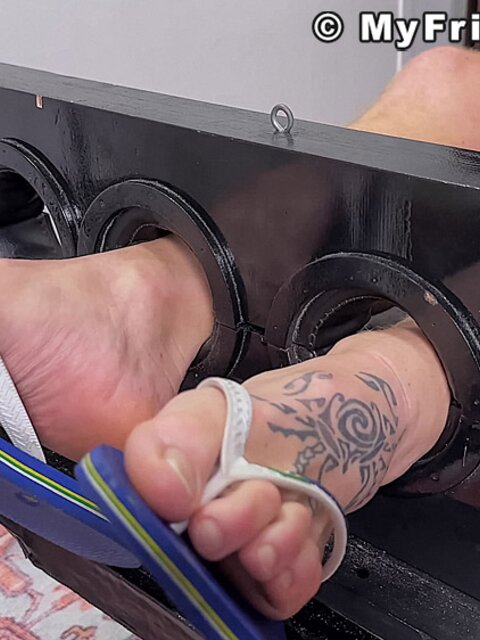 Anthony G laughs loudly during foot fetish and bondage tickling