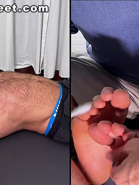 Daniel squirms as Dan Edwards tickles his bare feet
