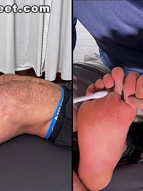 Daniel squirms as Dan Edwards tickles his bare feet
