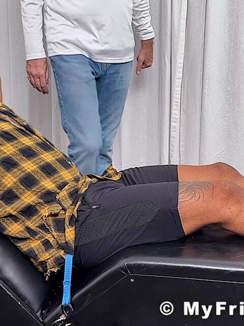 Lorenzo laughs hard as Dan Edwards tickles his ribs