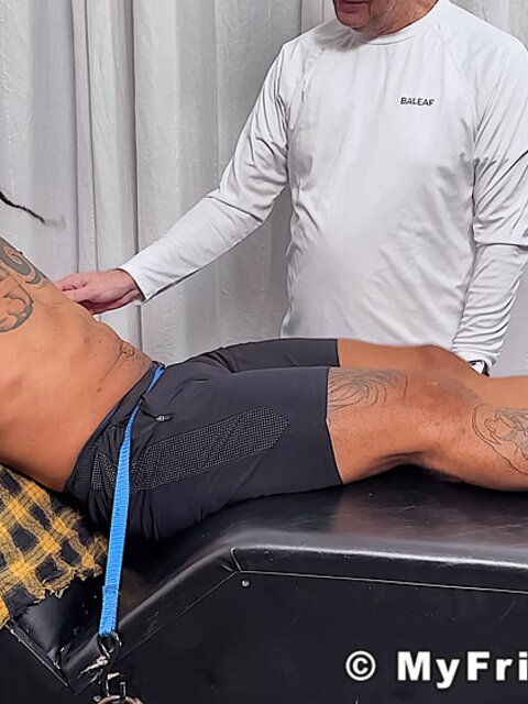 Lorenzo laughs hard as Dan Edwards tickles his ribs
