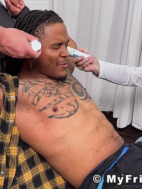 Lorenzo laughs hard as Dan Edwards tickles his ribs