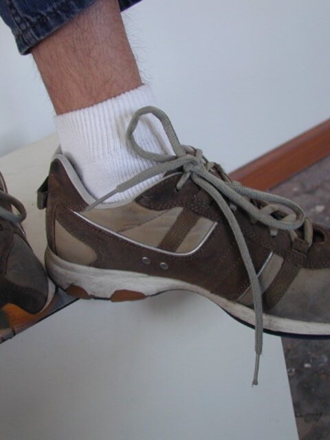 Sebastian shows his sweaty white socks after gym
