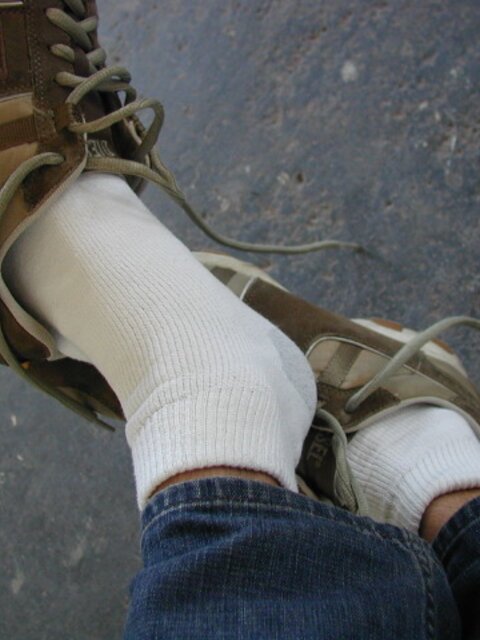 Sebastian shows his sweaty white socks after gym