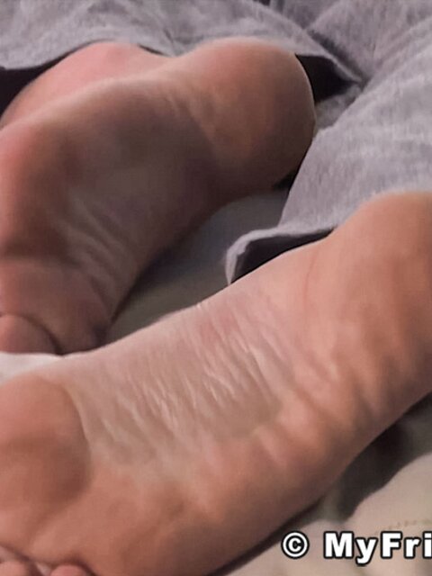 Hogan displays his smooth bare feet for your pleasure