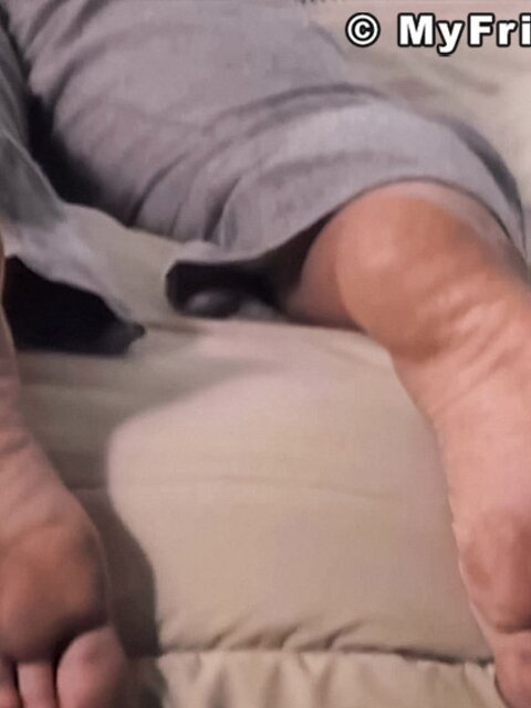 Hogan displays his smooth bare feet for your pleasure