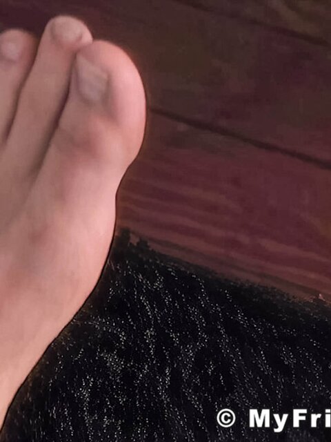 Hogan displays his smooth bare feet for your pleasure