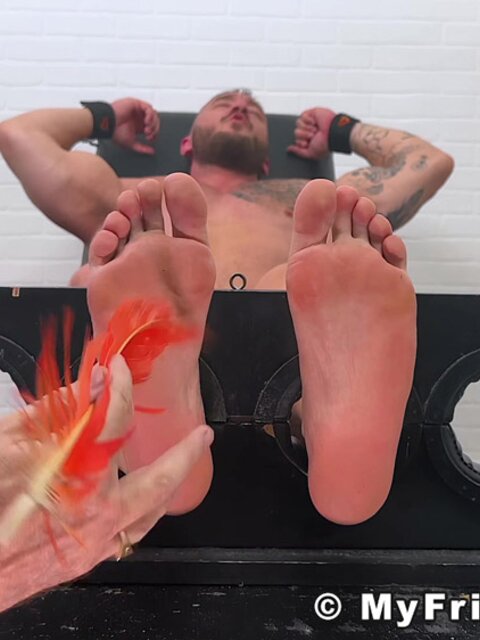 Thom tickles Scott Holliday in chair with Dan Edwards