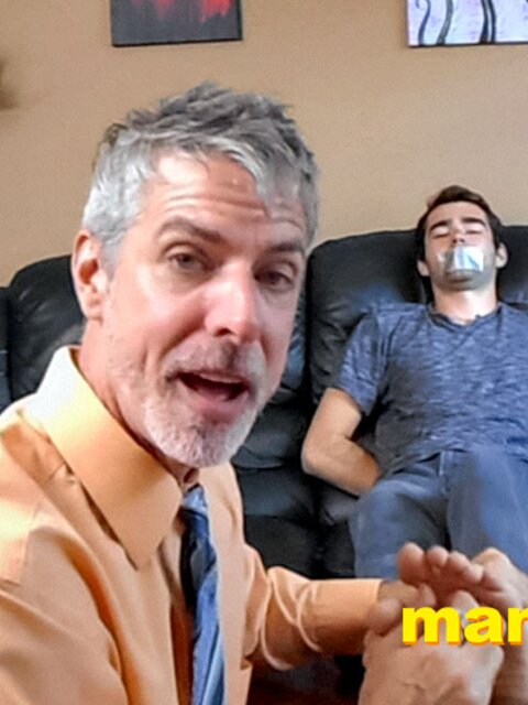Kody Tracer squirms as Richard Lennox tickles with brush
