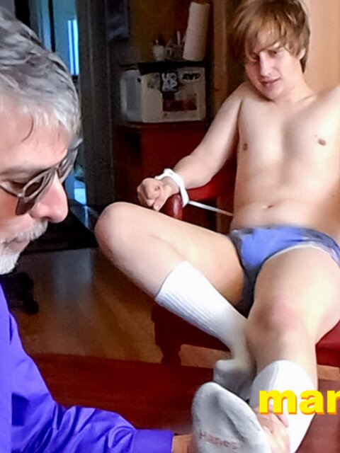 Richard Lennox tickles Elis Ataxxx’s feet to interrogate