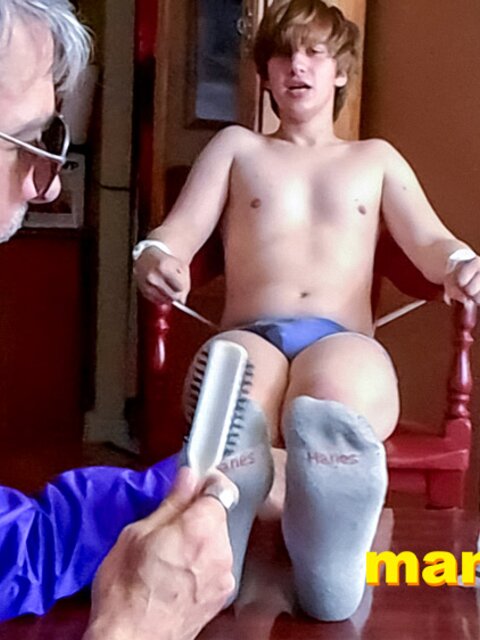 Richard Lennox tickles Elis Ataxxx’s feet to interrogate