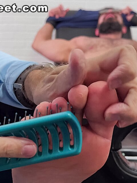 Gareth gets tickled by Dan Edwards on his size 13 feet