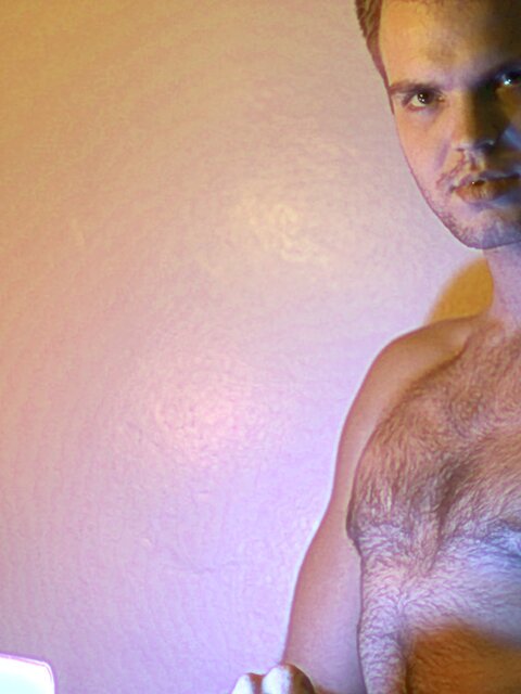 Billy Club teases with sexy poses and soft lighting in a hot gym shoot