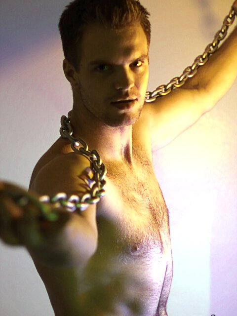 Billy Club teases with sexy poses and soft lighting in a hot gym shoot