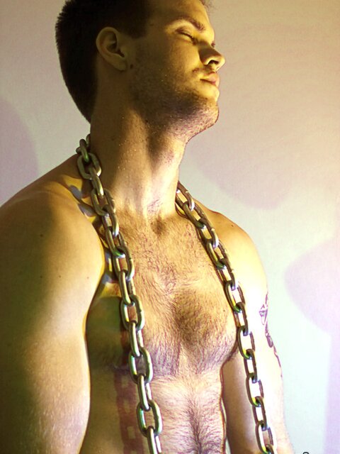 Billy Club teases with sexy poses and soft lighting in a hot gym shoot