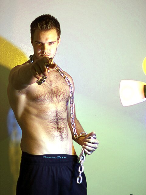 Billy Club teases with sexy poses and soft lighting in a hot gym shoot