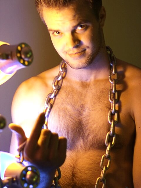 Billy Club teases with sexy poses and soft lighting in a hot gym shoot