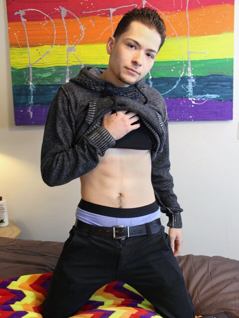 Hot twink Damian Good pumps his cock and lays back to squirt cum