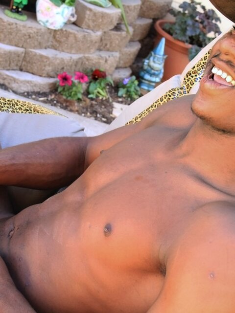 Moe Johnson wanks his big black cock outdoors