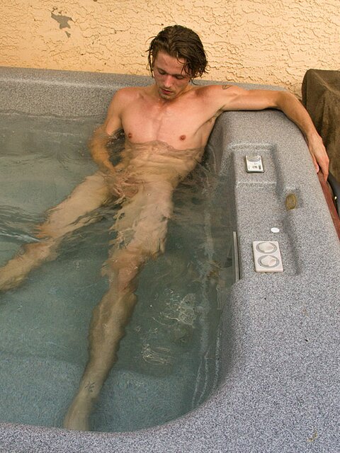 Derrick Dickem jerks off in the sun, smokes, and cums by the hot tub