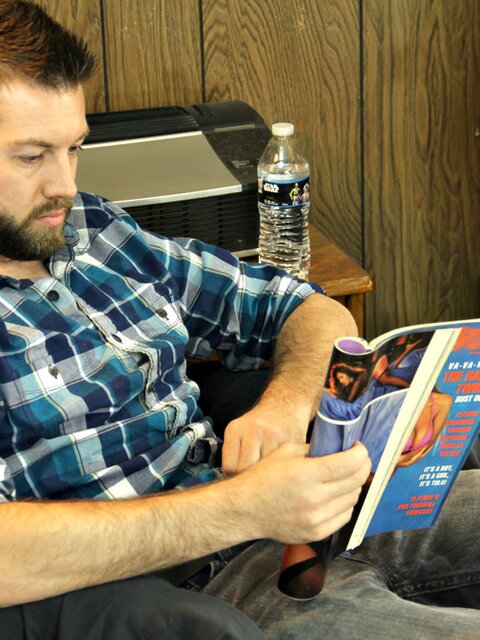 Bearded hunk Jason jerks off to pussy mags and swings his nuts around