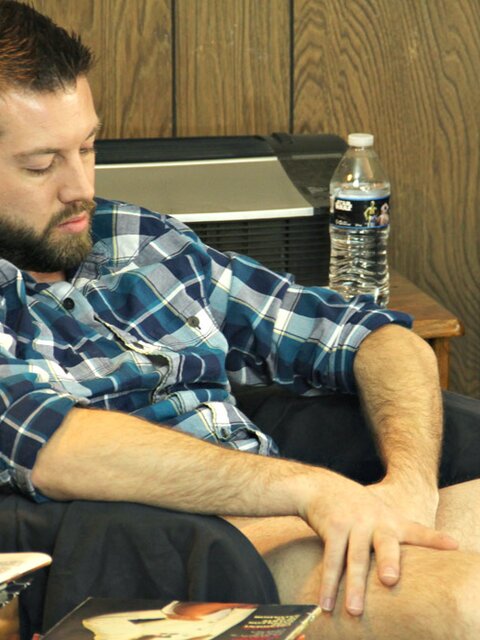 Bearded hunk Jason jerks off to pussy mags and swings his nuts around