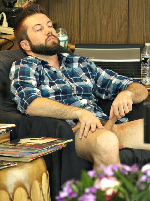 Bearded hunk Jason jerks off to pussy mags and swings his nuts around