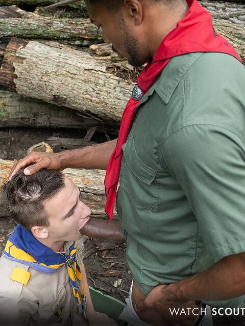 Scout Zac Steele worships Scoutmaster Sean Xavier’s huge cock in forest