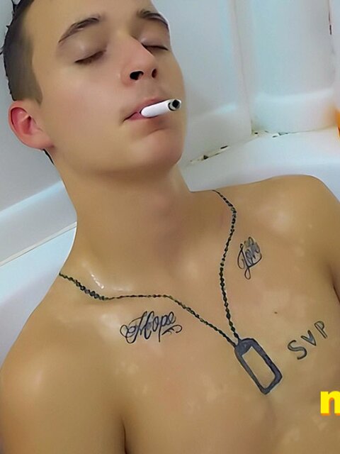 Tristan Sweet relaxes in bubbles, blowing smoke and teasing himself