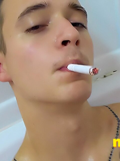 Tristan Sweet relaxes in bubbles, blowing smoke and teasing himself