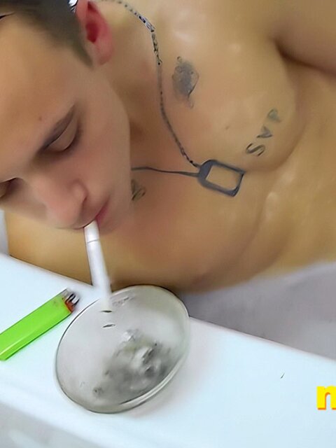 Tristan Sweet relaxes in bubbles, blowing smoke and teasing himself