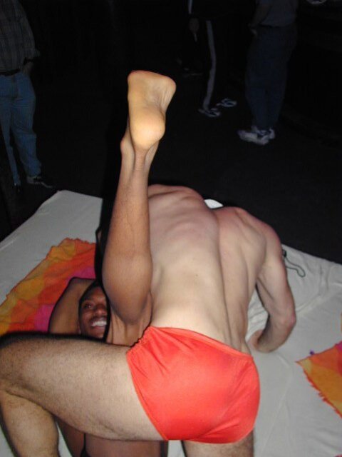 Lamar and John’s foot fetish and muscle play heats up the faux beach