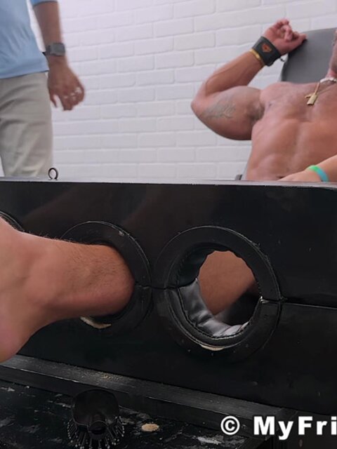 Bound Jesse laughs uncontrollably as electric toothbrushes tickle him