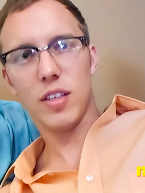 Giant nerd Travis Smith bats you away as you crawl toward his smelly socks