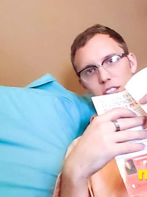 Giant nerd Travis Smith bats you away as you crawl toward his smelly socks