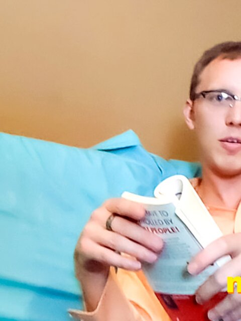 Giant nerd Travis Smith bats you away as you crawl toward his smelly socks