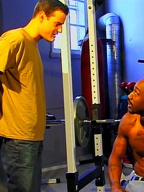 Brandon Tamarin bends over to take Bam’s big black cock deep inside