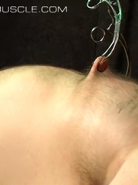 Bigg Pete is tied down and gagged before nipple clamps go on
