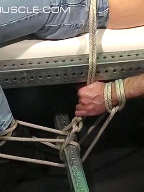 Bigg Pete is tied down and gagged before nipple clamps go on