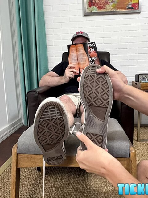 The Doctor groans while CDubs sucks his bare soles