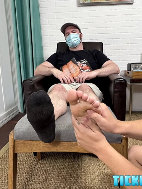 The Doctor groans while CDubs sucks his bare soles
