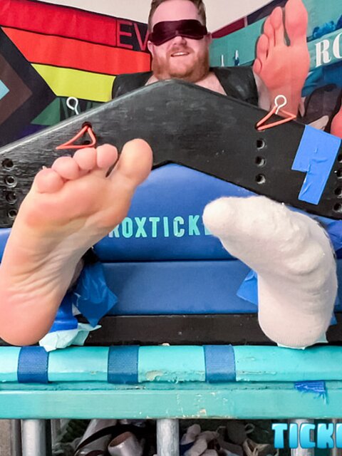 Ryan giggles and squirms under Matt’s tickling fingers