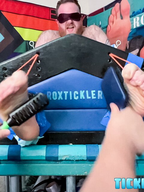 Ryan giggles and squirms under Matt’s tickling fingers