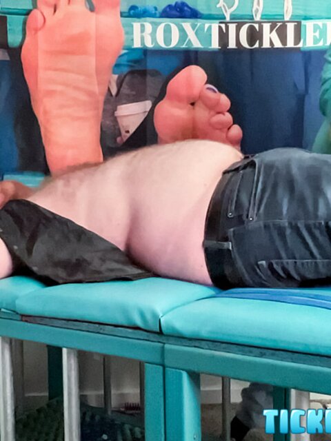 Ryan giggles and squirms under Matt’s tickling fingers