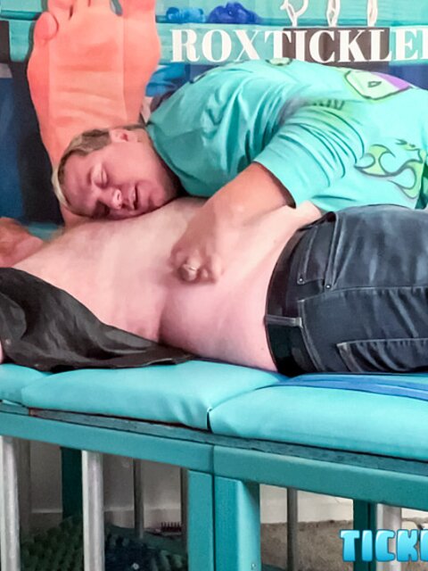 Ryan giggles and squirms under Matt’s tickling fingers