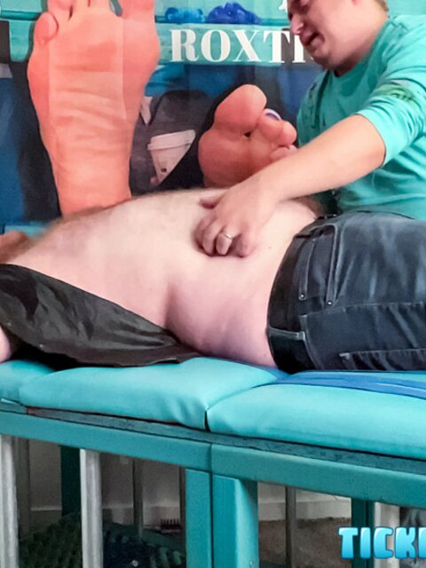Ryan giggles and squirms under Matt’s tickling fingers