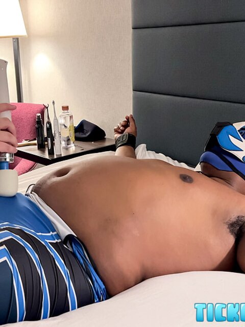 Pup Bard cums hard with a vibrator inside his wrestling singlet
