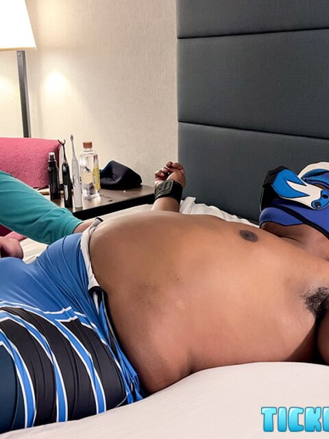 Pup Bard cums hard with a vibrator inside his wrestling singlet